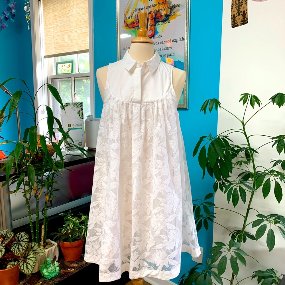 Anthropologie dress. White color. Size Medium
